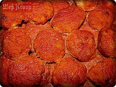 Рыбные котлеты, запеченные в томатном соусе